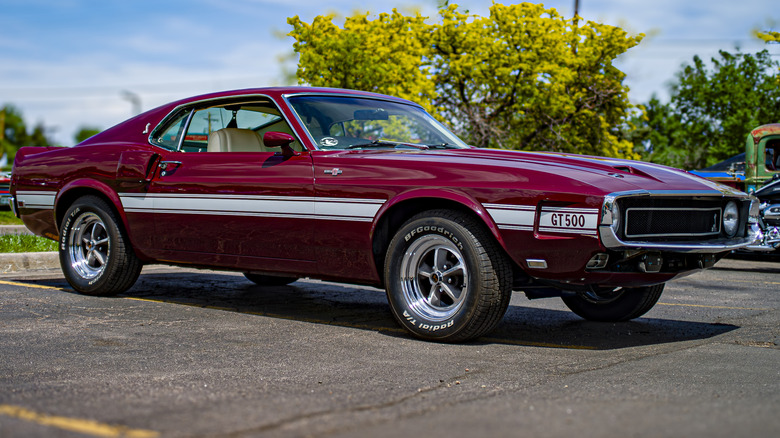 Dark red 1969 Ford Mustang Shelby GT500 front 3/4 view