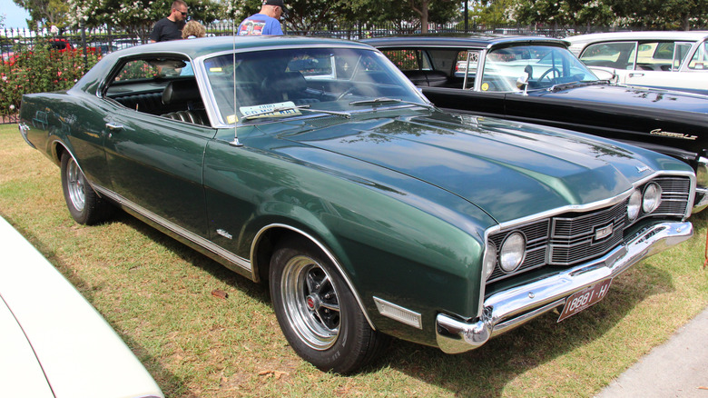 A green 1968 Mercury Comet Cobra Jet parked on grass