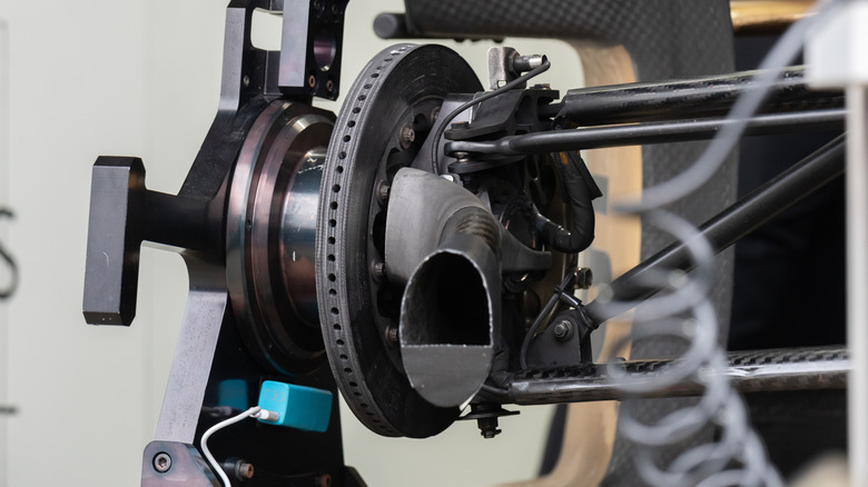 Brake cooling duct leading to the front disc brake rotor of a Formula race car.