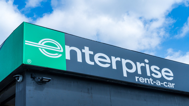 An Enterprise Rent-A-Car location, with the logo on the corner of the building.
