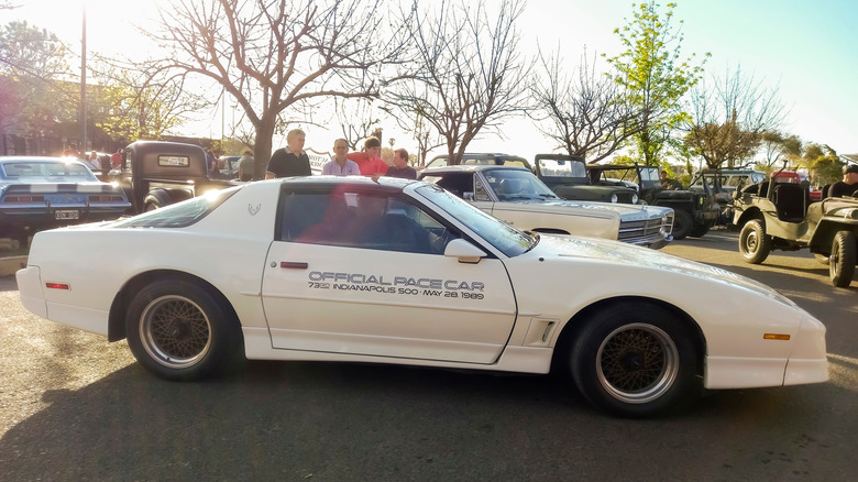 1989 Pontiac Firebird Trans Am Indy 500 pace car in a parking lot.