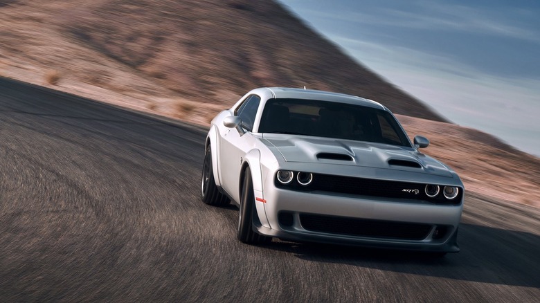 Dodge Challenger SRT Hellcat Redeye front 3/4 view during cornering