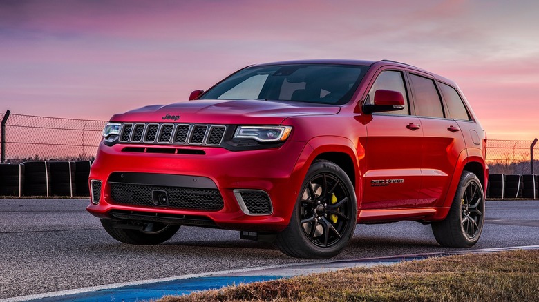 Jeep Grand Cherokee Trackhawk parked on track front 3/4 view