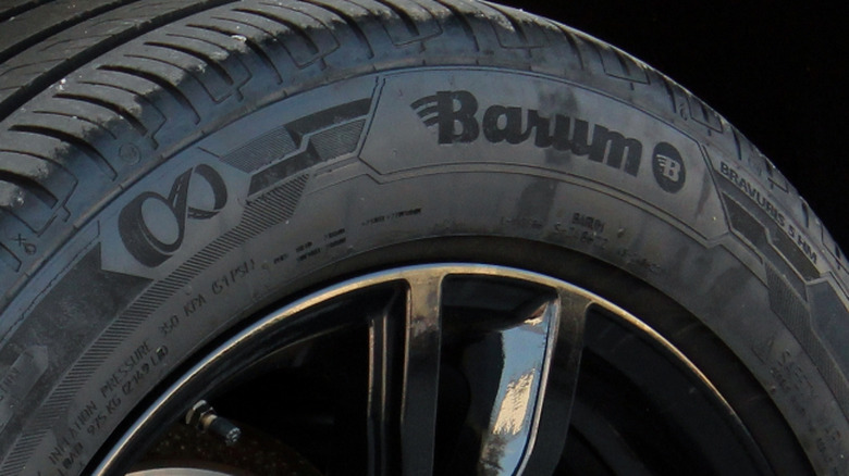 Closeup of a Barum tire on a white BMW