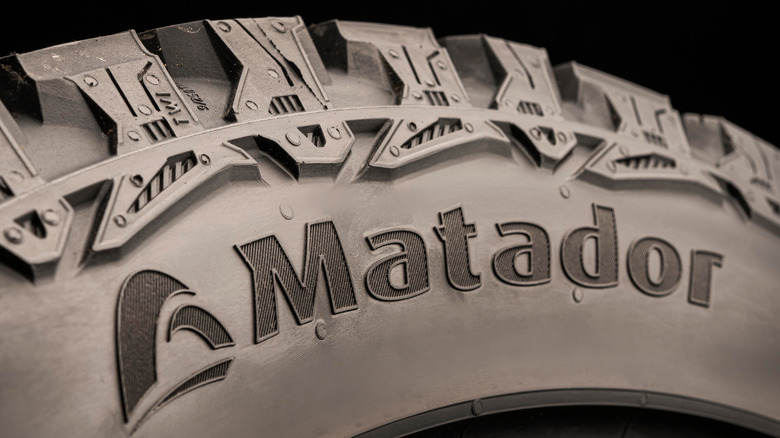 Logo of Matador shown on the side of a tire.