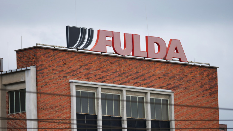 Building sports "Fulda" sign on its roof/
