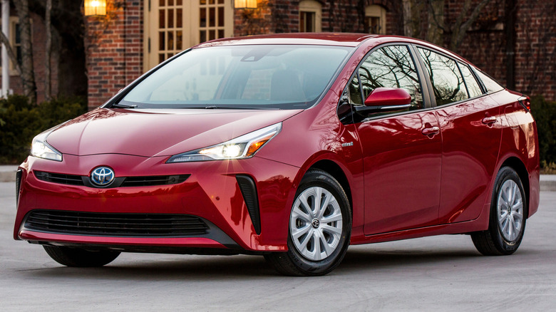 2020 Toyota Prius LE parked in front of a building
