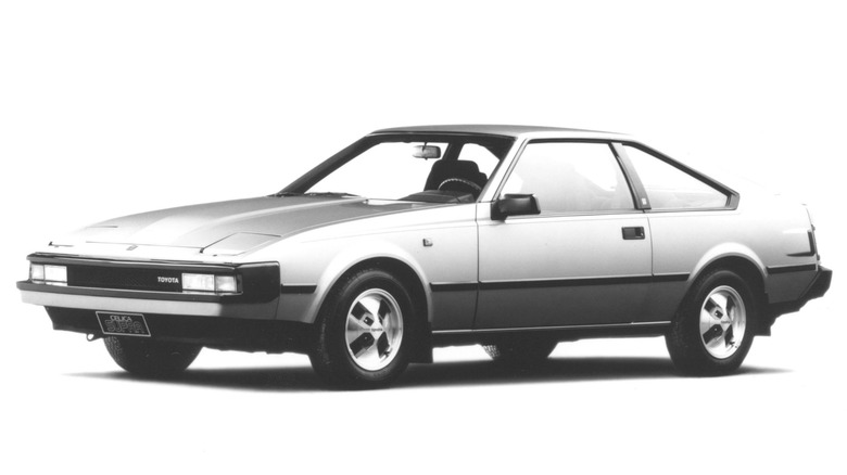 A black-and-white period shot of the 1982 Toyota Celica Supra against a white background