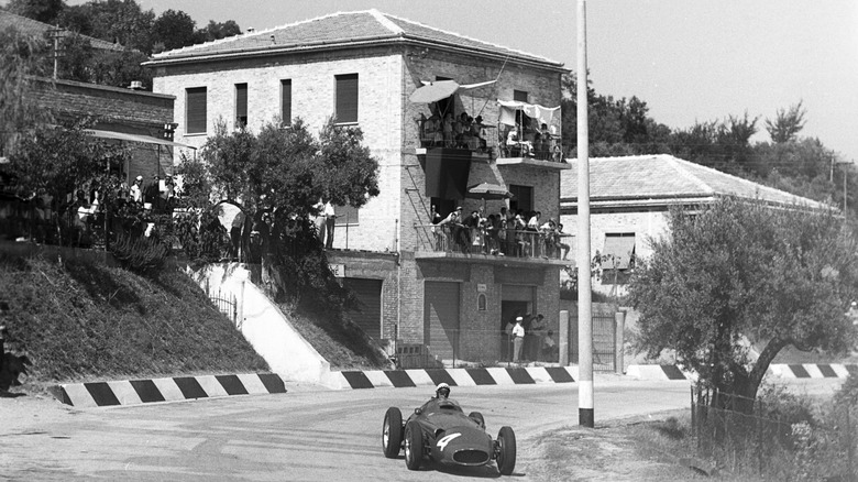 Maserati F1 car navigates the bends at the 1957 Pescara Grand Prix.