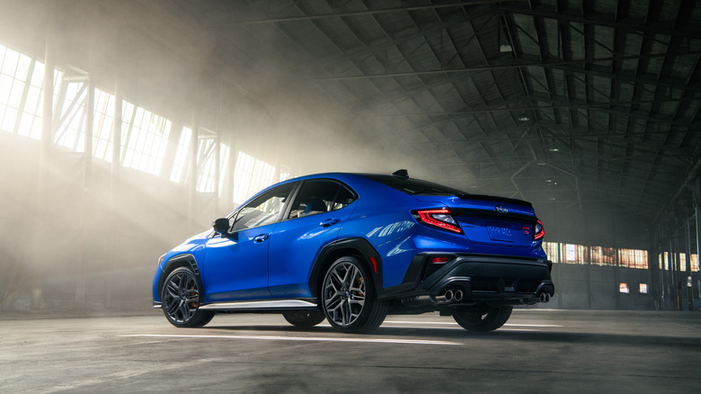 A blue Subaru WRX from the rear