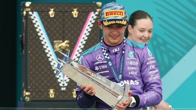 Race winner Andrea Kimi Antonelli of Italy and Mercedes AMG Petronas F1 Team on the podium with his trophy during the F1 Grand Prix of Miami at Miami International Autodrome on May 03, 2026 in Miami, Florida.