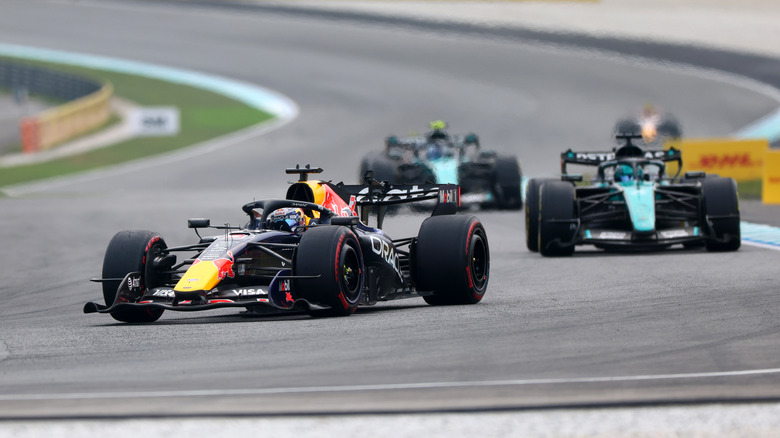 Max Verstappen of the Netherlands driving the (3) Oracle Red Bull Racing RB22 Red Bull Ford Powertrains leads George Russell of Great Britain driving the (63) Mercedes AMG Petronas F1 Team W17 on track during the F1 Grand Prix of Bahrain in Malaysia at Sepang Circuit on October 04, 2026 in Kuala Lumpur, Malaysia.