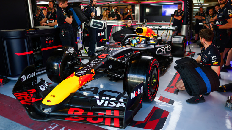 Isack Hadjar of France and Oracle Red Bull Racing prepares to drive in the garage during F1 Testing at Yas Marina Circuit on December 09, 2025 in Abu Dhabi, United Arab Emirates.