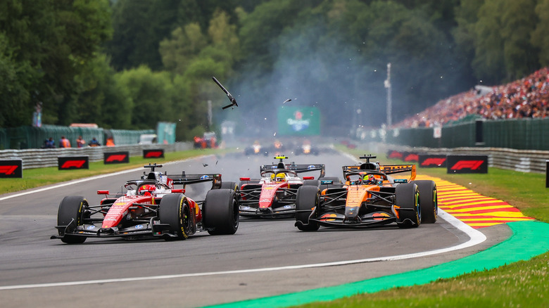 Oscar Piastri of Australia driving the (81) McLaren MCL40 on track makes contact with Charles Leclerc of Monaco driving the (16) Ferrari SF-26 on track during the F1 Grand Prix of Belgium at Circuit de Spa-Francorchamps on July 19, 2026 in Spa, Belgium.