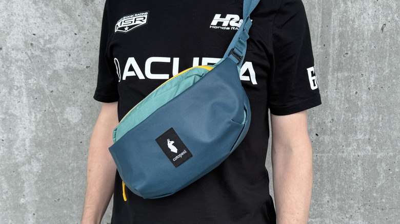 Fanny pack worn over the shoulder on race day