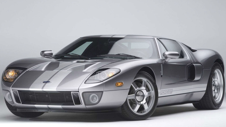 A silver Ford GT sitting in nondescript room