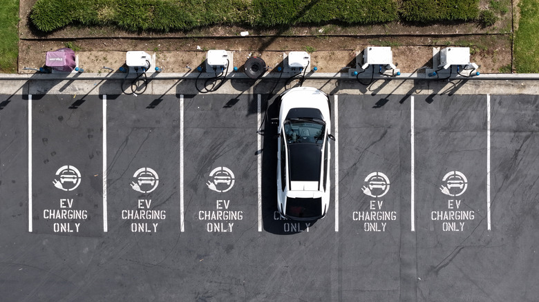 Aerial view of an electric vehicle using an EVgo charger,