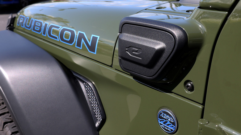 A view of a charging point on a Jeep Wrangler 4Xe plug-in hybrid that is displayed on the sales lot at Hilltop Chrysler Jeep Dodge Ram on April 05, 2024 in Richmond, California.