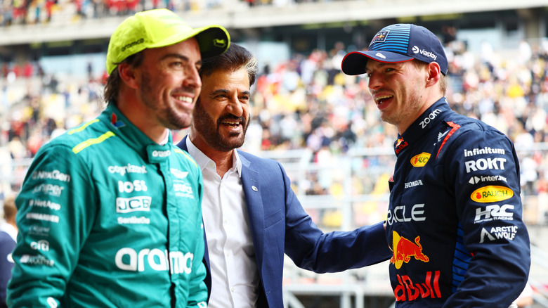 Pole position qualifier Max Verstappen of the Netherlands and Oracle Red Bull Racing, Third placed qualifier Fernando Alonso of Spain and Aston Martin F1 Team and Mohammed ben Sulayem, FIA President talk in parc ferme after qualifying ahead of the F1 Grand Prix of China at Shanghai International Circuit on April 20, 2024 in Shanghai, China.