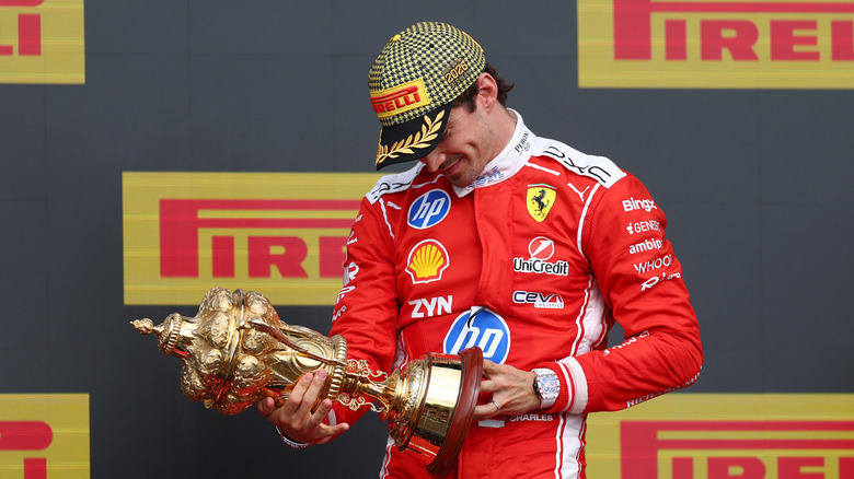 Race winner Charles Leclerc of Monaco and Scuderia Ferrari on the podium with his trophy during the F1 Grand Prix of Great Britain at Silverstone Circuit on July 05, 2026 in Northampton, England.