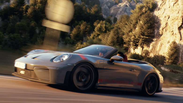 A Porsche 911 GT3 S/C exiting a tunnel in "Clutch."