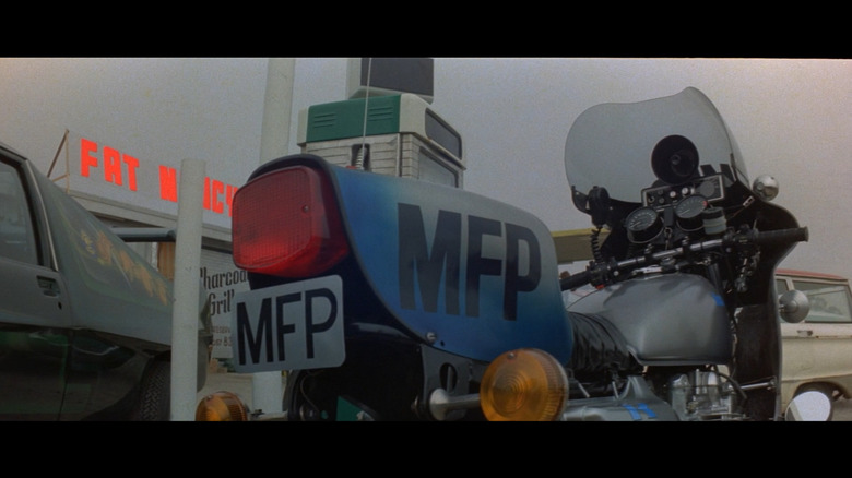 Goose's metallic MFP Kawasaki from behind