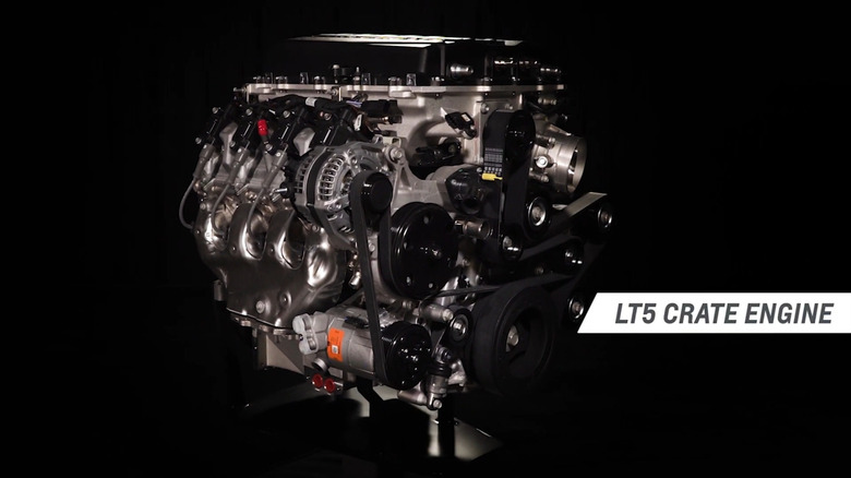A 2019 Chevrolet 6.2-liter supercharged LT5 V8 crate engine as used in the 2019 Chevrolet Corvette ZR1 against a black background