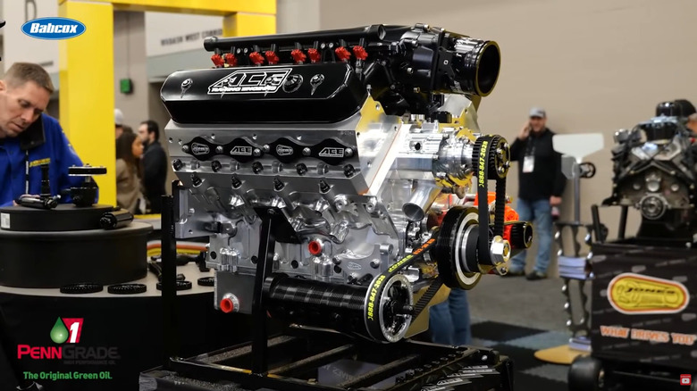 ACE Racing Engines 427 billet LS V8 Chevrolet engine sitting on a stand at a convention