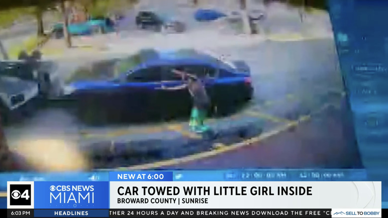 florida tow truck drives off with girl still inside car