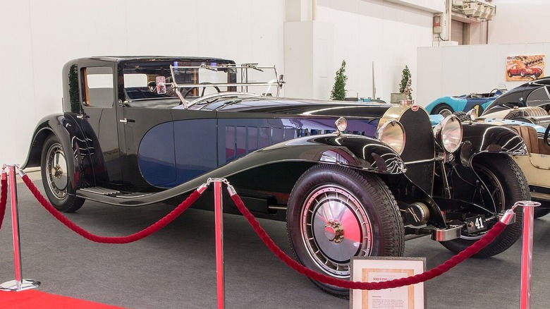 A Bugatti Type 41 Royale on display in a showroom