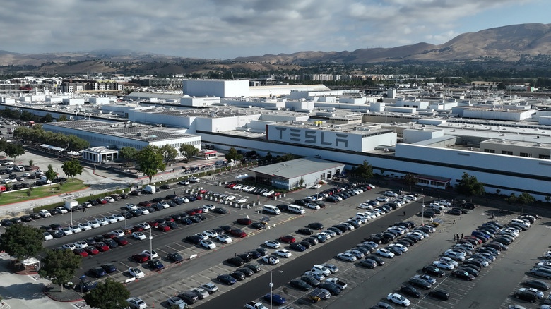 In an aerial view, the exterior of the Tesla automotive company manufacturing facility is seen on September 18, 2023 in Fremont, California.