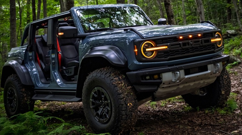 2025 Ford Bronco Raptor on a trail in a forest