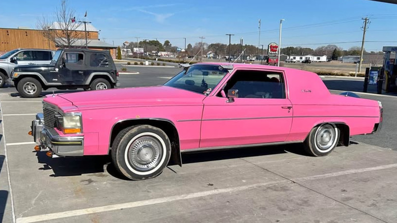 A pink Cadillac DeVeille coupe