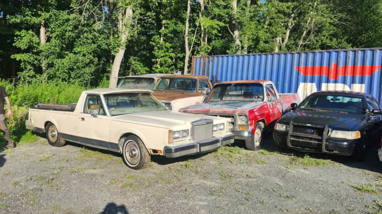Lincoln Town Car ute in a lot of cars