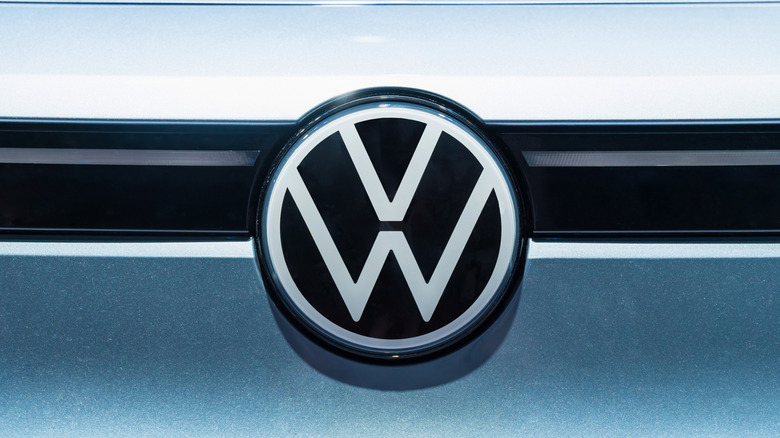 Volkswagen id4 emblem on car. vw logo and electric car icon. Volkswagen Electric Car shows its emblem at Shanghai Auto Show.China, Shanghai, May 2, 2025.