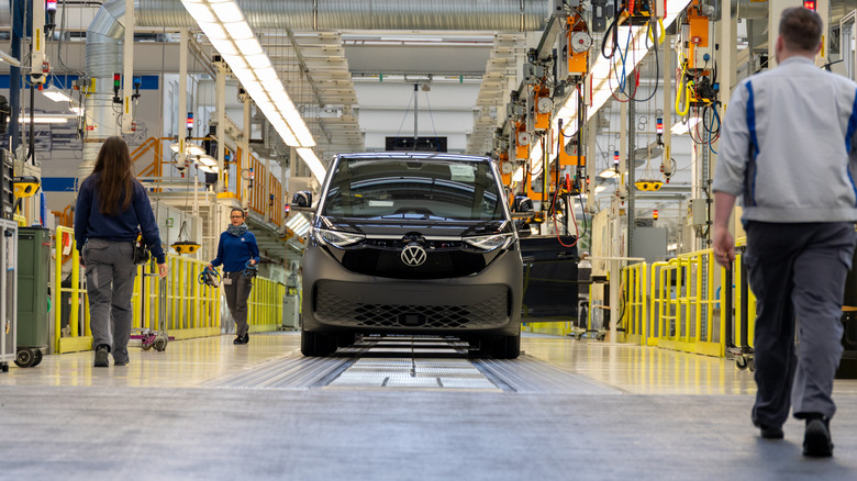 A new VW ID. Buzz electric van prepares to pass final inspection at the Volkswagen commercial vehicles van and bus factory on March 4, 2026 in Hanover, Germany.