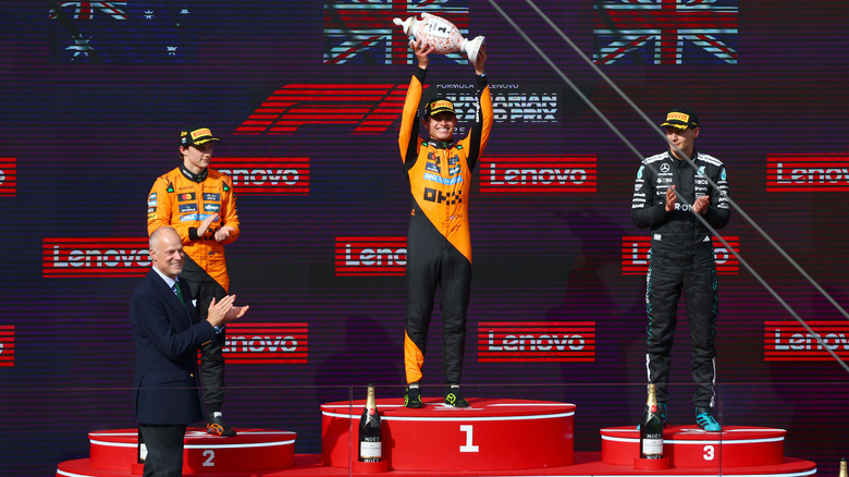 McLaren F1 driver Lando Norris celebrates a win.