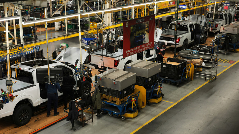 Ford F-150's being built on an automotive manufacturing line at Dearborn Assembly