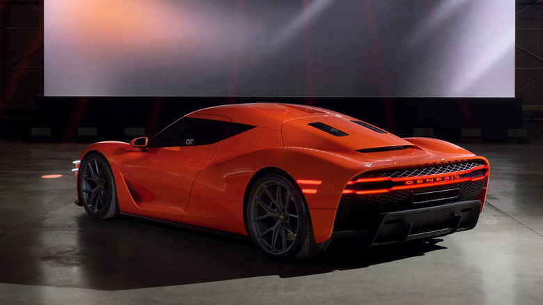 Rear 3/4 view of the orange Genesis Magma GT concept