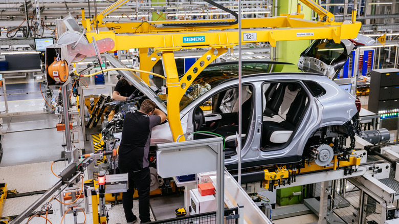 Workers assemble the new Mercedes-Benz GLA small SUV at the Mercedes-Benz factory on September 17, 2026 in Rastatt, Germany.