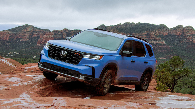 A bluish 2024 Honda Pilot