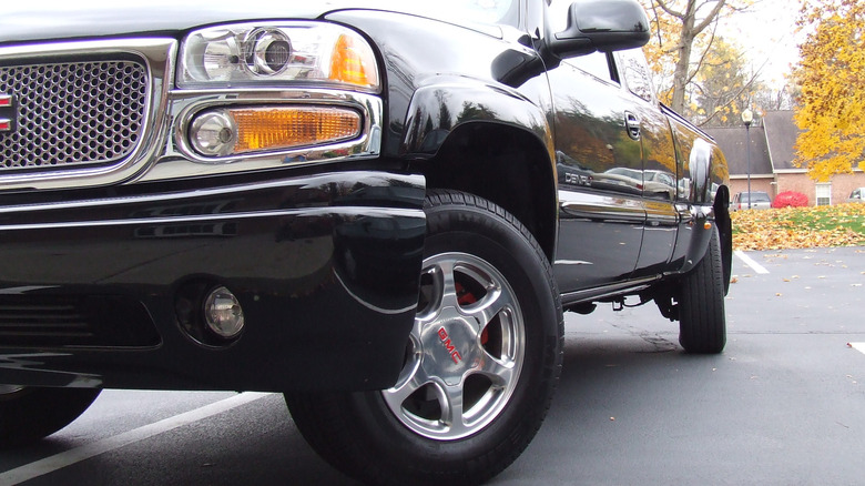 A black GMC Sierra Denali with Quadrasteer or rear-wheel steering