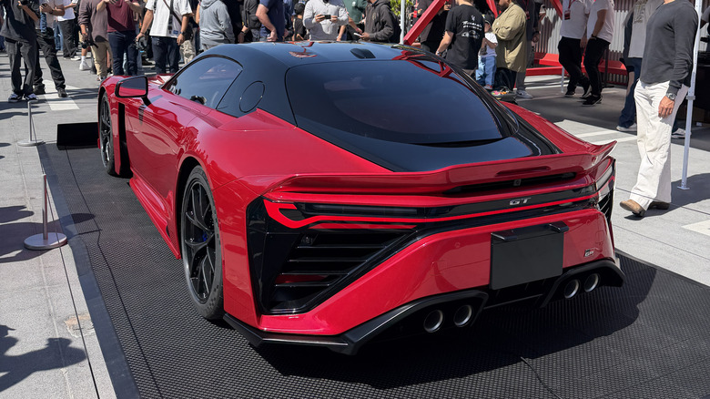 Rear 3/4 view of a red GR GT at the Petersen museum