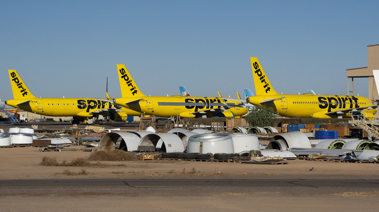 Spirit Airlines planes sit parked at the Phoenix Goodyear Airport on May 8, 2026 in Goodyear, Arizona. The budget airline ceased all operations on May 2, 2026.