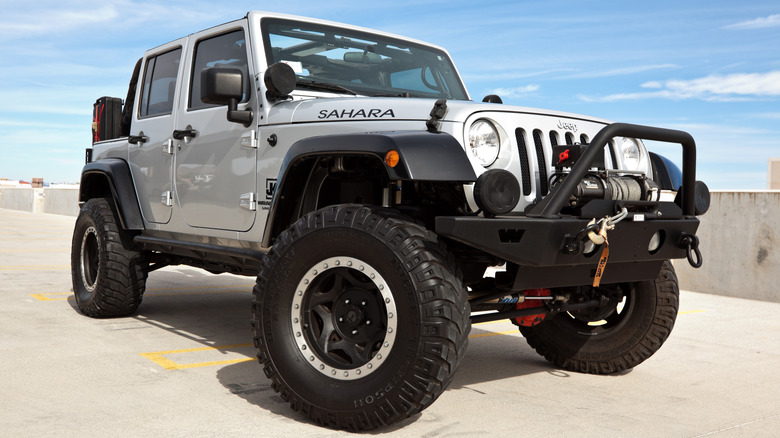 Jeep with winch, bumpers and sliders