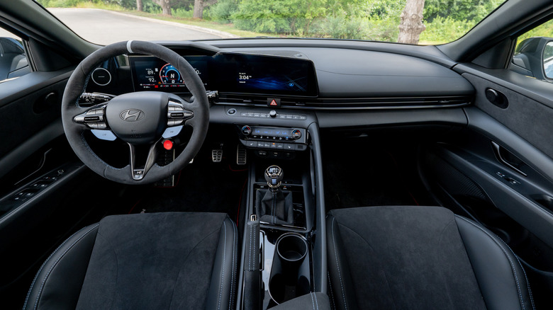 A look at the all-black dashboard and front seats of the Elantra N TCR