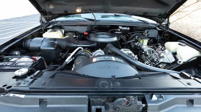 A 1994 black Chevrolet Suburban 1500 Silverado 5.7-liter small block V8 engine