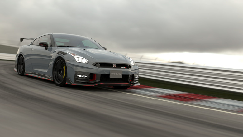 A gray Nissan GT-R on track