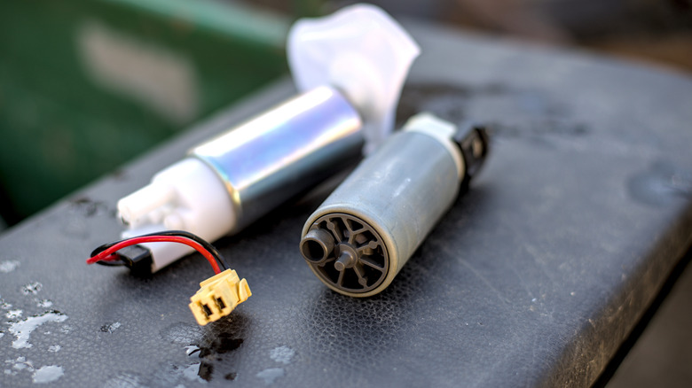 A new and a used electric fuel pump next to each other
