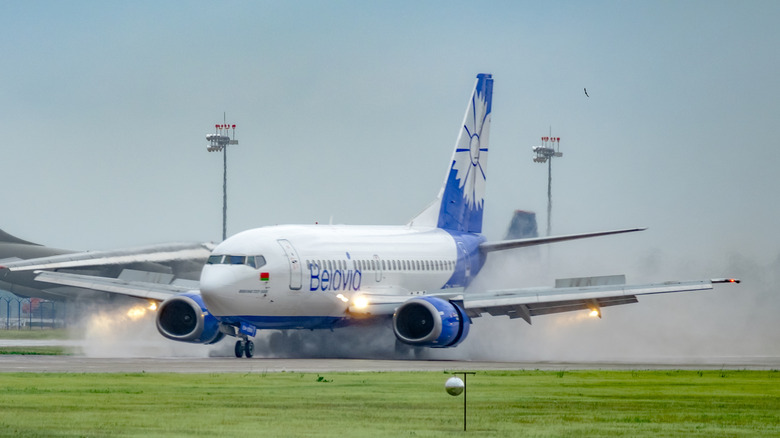 A jet aircraft making a hard landing.
